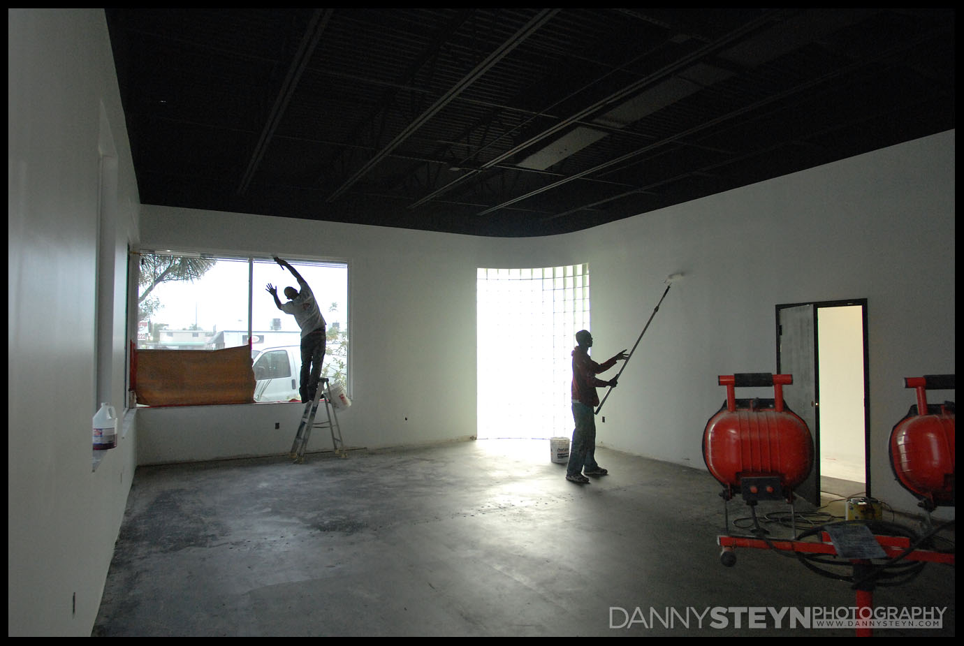 New Photography Studio construction - Studio walls and window frames being painted