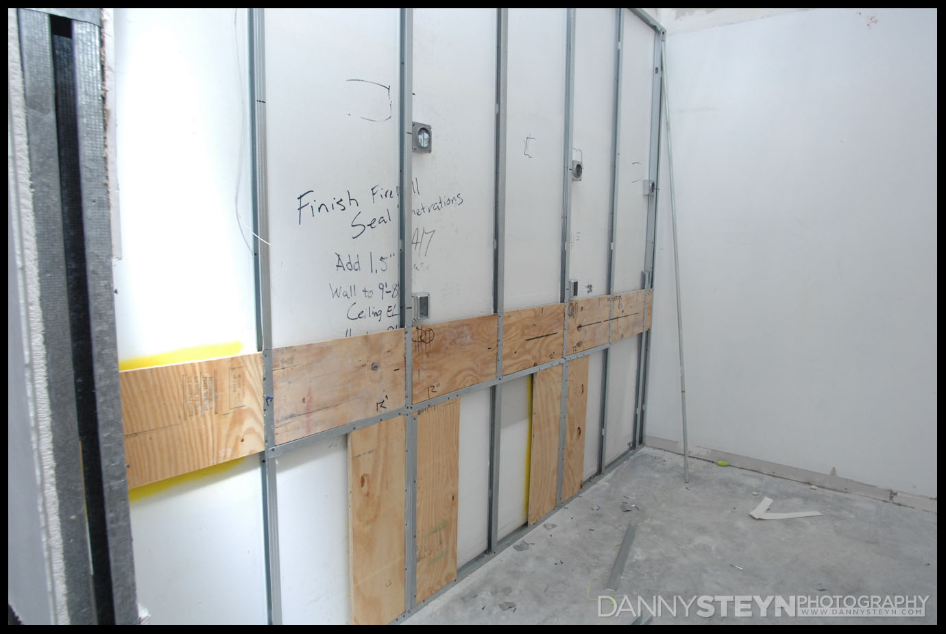 Plywood bracing for makeup counter in the Makeup Room. One full width mirror with lighting for 3 stations and outlets for hairdryers, curling tongs etc.