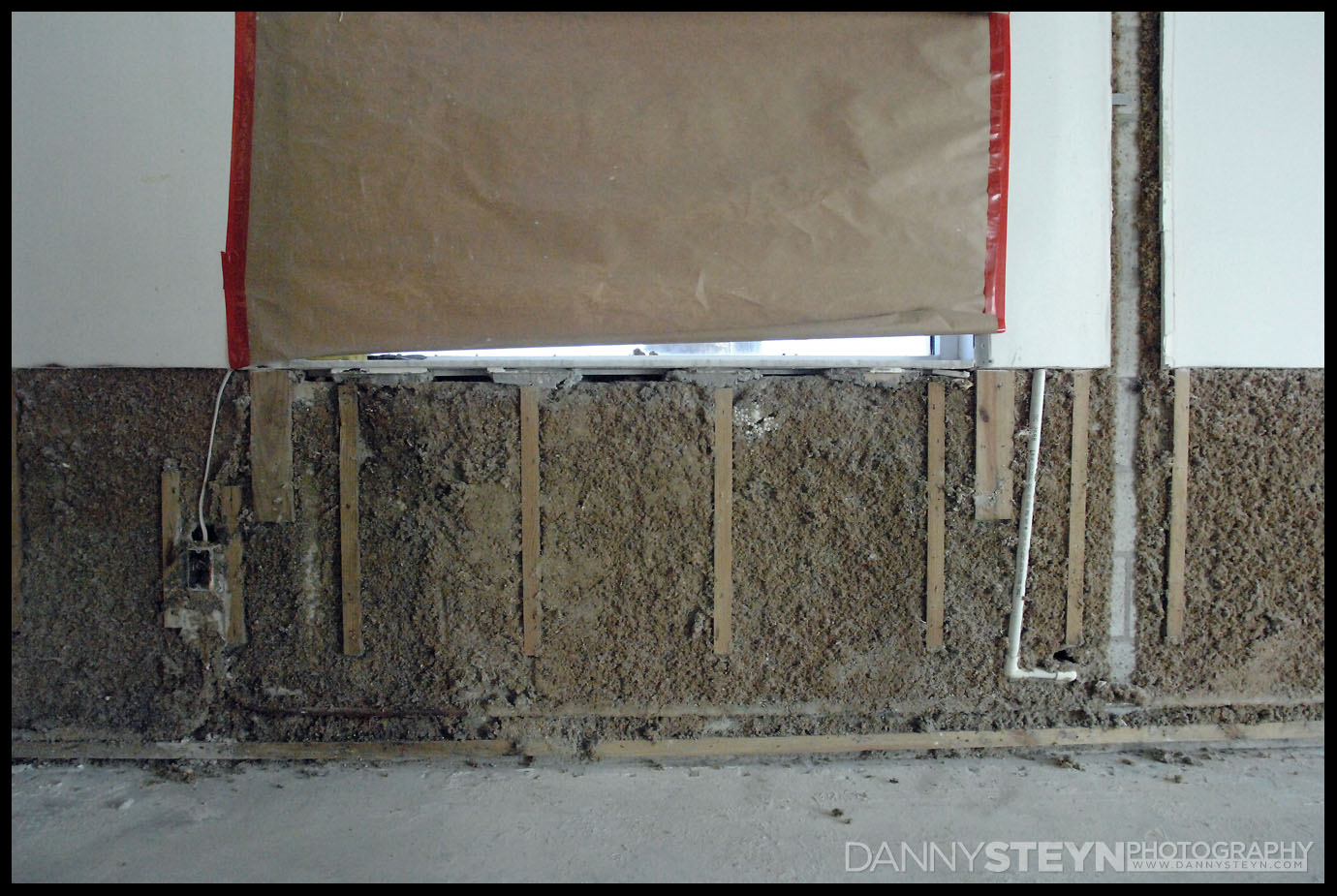 Damaged drywall due to leaking window seals that needs to be replaced in the Daylight Studio