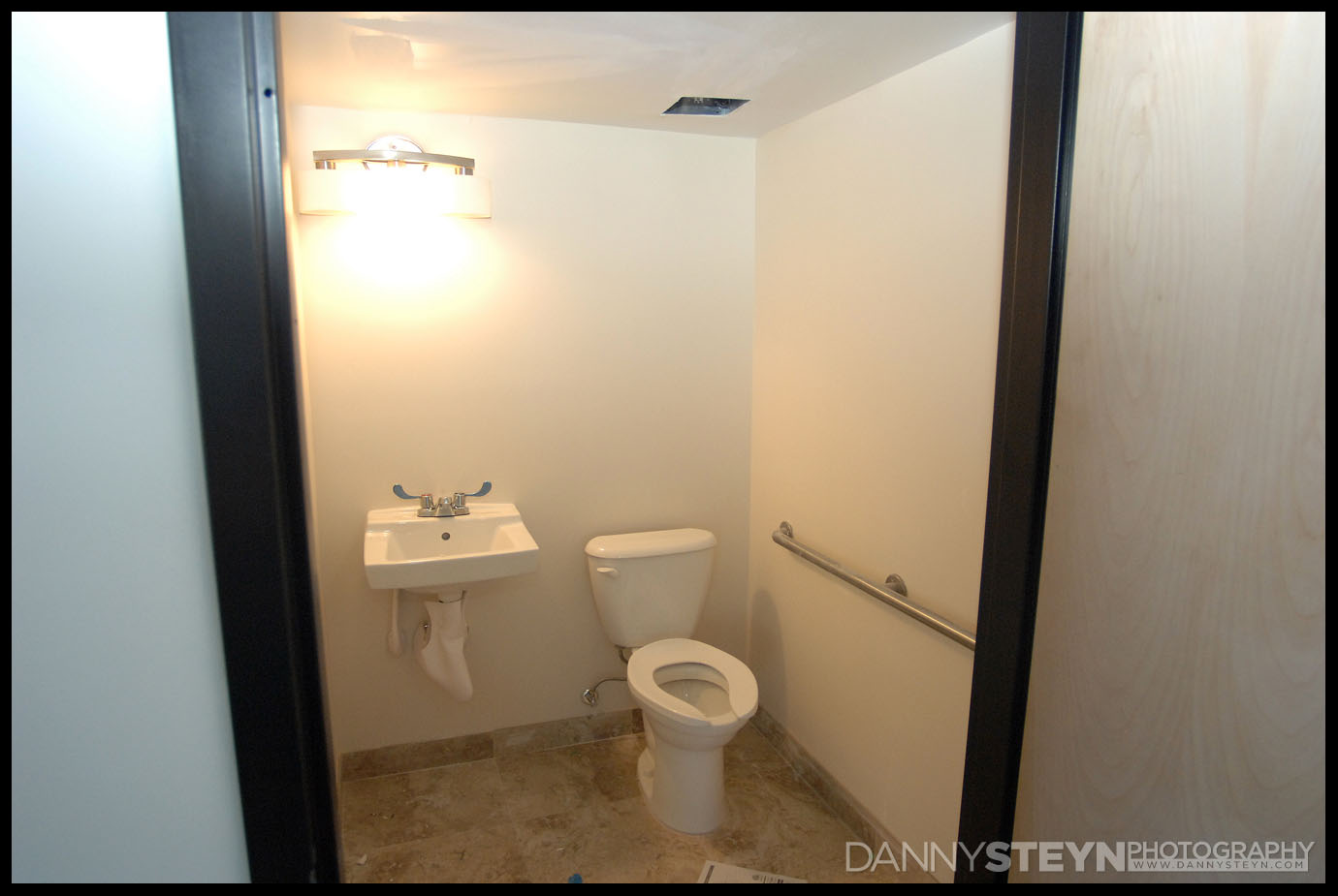 Updated small bathroom (non ADA) - new tiles and fixtures